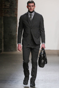 Model walks runway in an outfit from Asaf Ganot Autumn Winter 2015 collection.